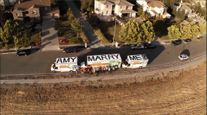 Ehvan Tran's proposal to his girlfriend Amy wouldn't have been possible without the help of his friends and three U-Haul trucks.