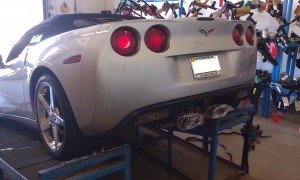 This Corvette’s owner needed a hitch to carry a luggage rack.