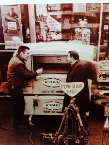 Wallace “Dee” DeGroot (left) is seen in 1961 working at his Flying A & U-Haul service station in Syracuse, N.Y.