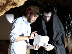 Josh Falkum goes over the script with an actor while filming "Afterlife," which won first prize in the college division in the 2014 Project Yellow Light competition.