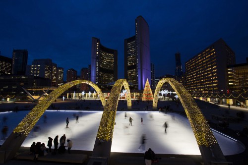 Ice skating under the Freedom Arches at Nathan Phillips Square. Toronto is the U-Haul No. 1 Canadian Growth City for 2015