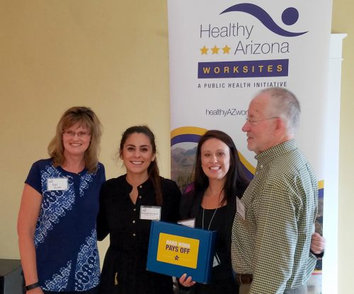 U-Haul Company's Angie DeWinter, Monique Wantland and Jessica Lopez accepted the HAWP Award on U-Haul Company's behalf
