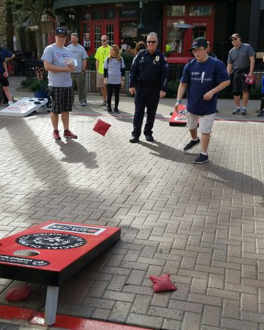 Cornhole was popular among many Special Olympics athletes at the 2017 Guardian Games, which U-Haul helped sponsor
