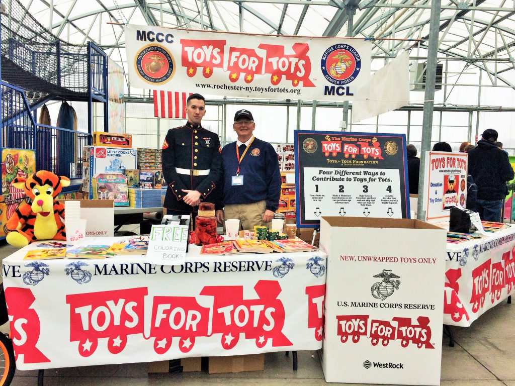 Toys for Tots donation station with Marines