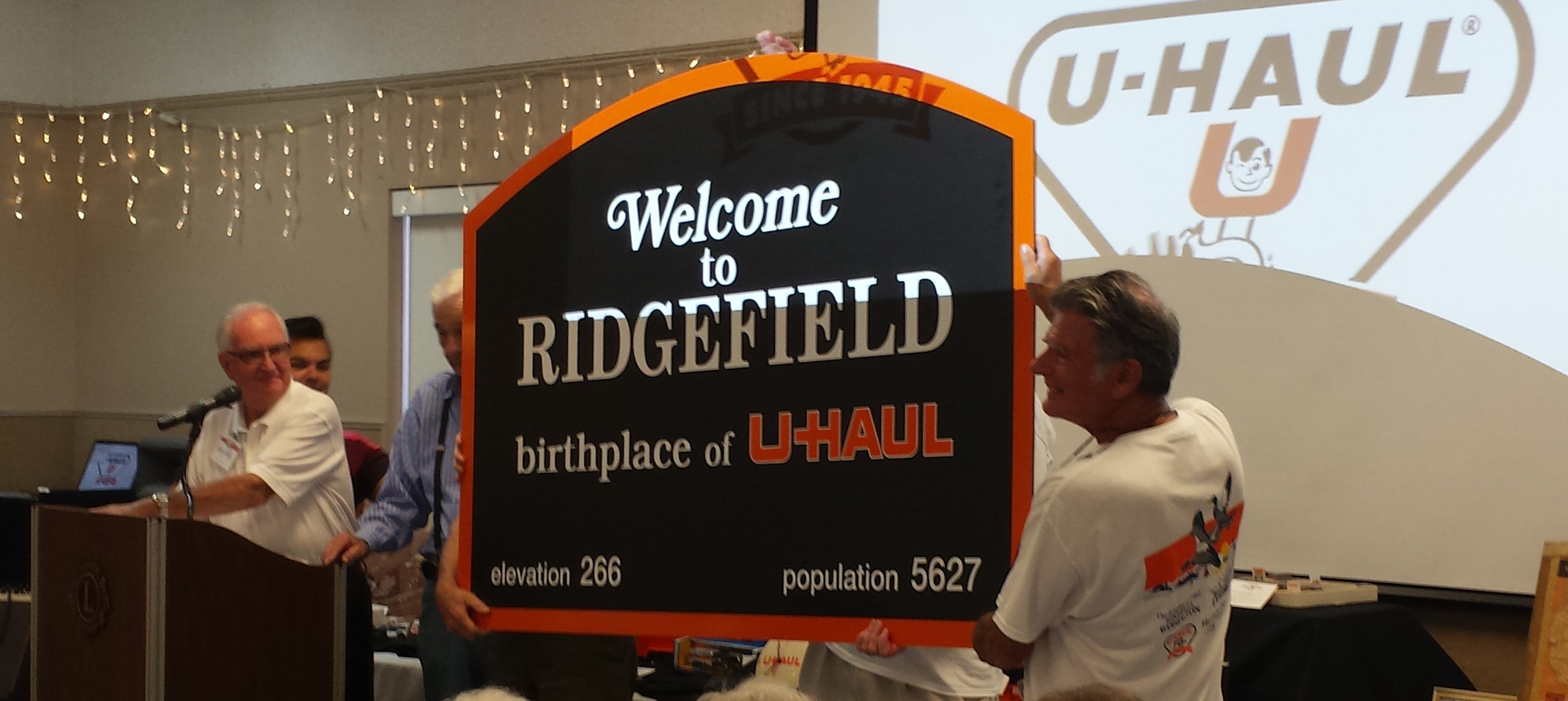 U-Haul presented Ridgefield mayor Ron Onslow and the town with a new sign for Ridgefield Heritage Day.
