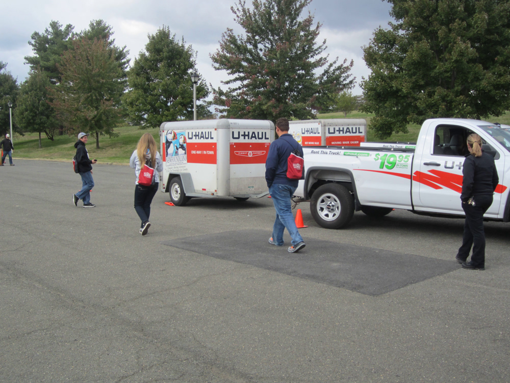 Students backing up a U-Haul trailer