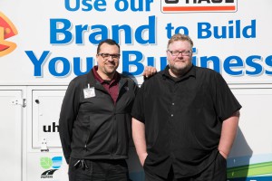 U-Haul ADVP Victor Vanegas (left) and MCP Aaron Anderson pose at the U-Haul event in Roseville.