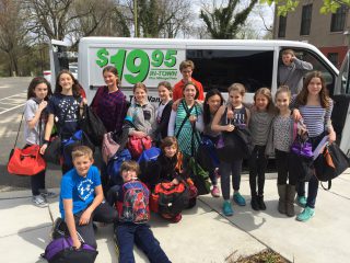 7th Grade Class uses U-Haul Cargo Van to bring Comfort Cases to Foster Kids