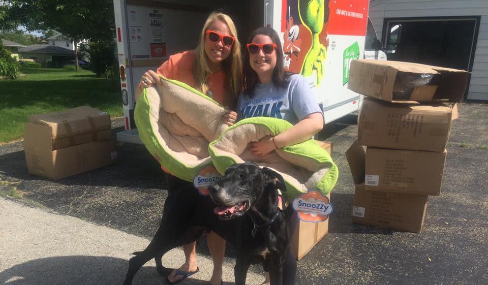 Live Like Roo donates dog beds in U-Haul Truck
