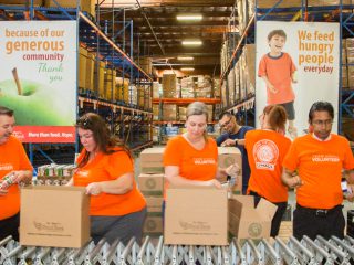 U-Haul Delivers Food, Funds and Volunteers to St. Mary’s Food Bank