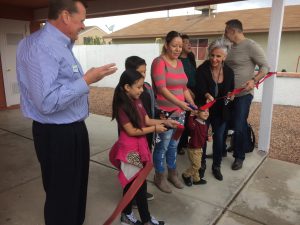 Homes for the Holidays recipients cut ribbon on new home