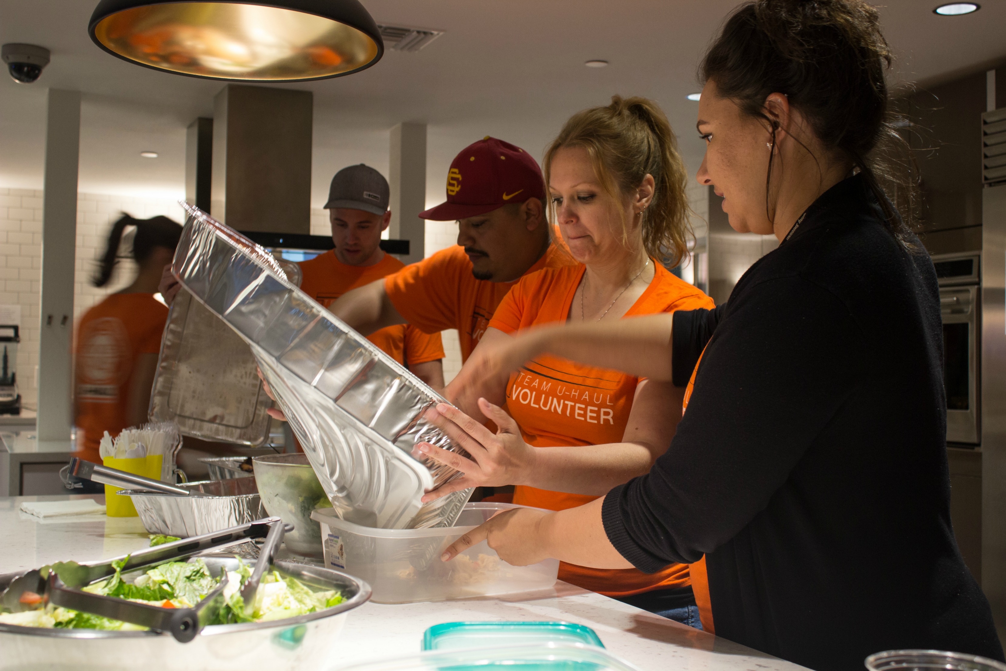 U-Haul Volunteers preparing food at Ronald McDonald House
