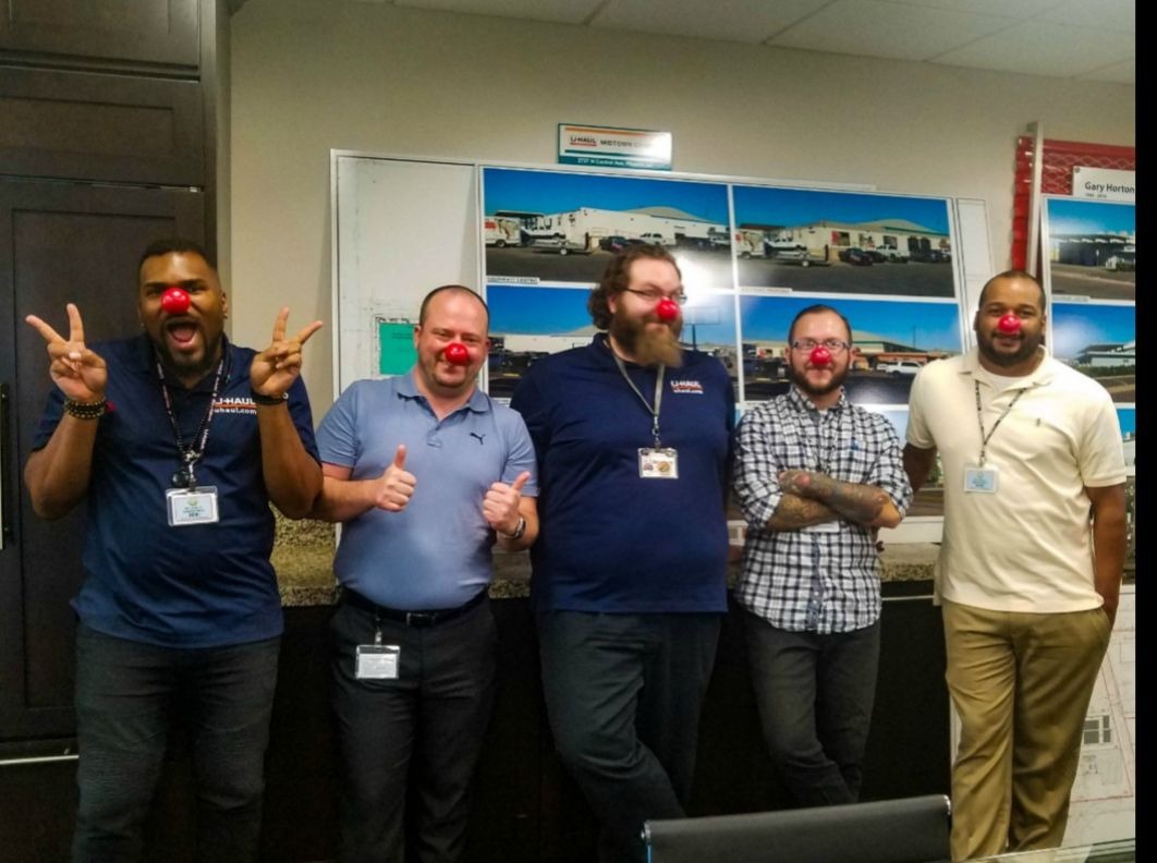U-Haul Team Members Wear Red Noses to Fight Child Hunger