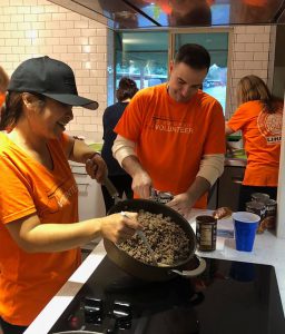 U-Haul volunteers preparing dinner at Ronald McDonald House Charities in Midtown Phoenix on Oct. 18, 2018