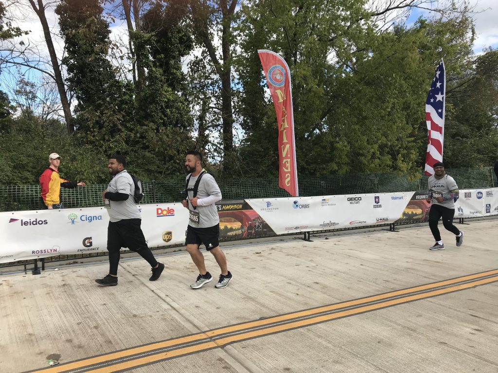Team U-Haul finishing the 43rd Annual Marine Corps Marathon.