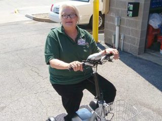Cathy Engle with motor scooter