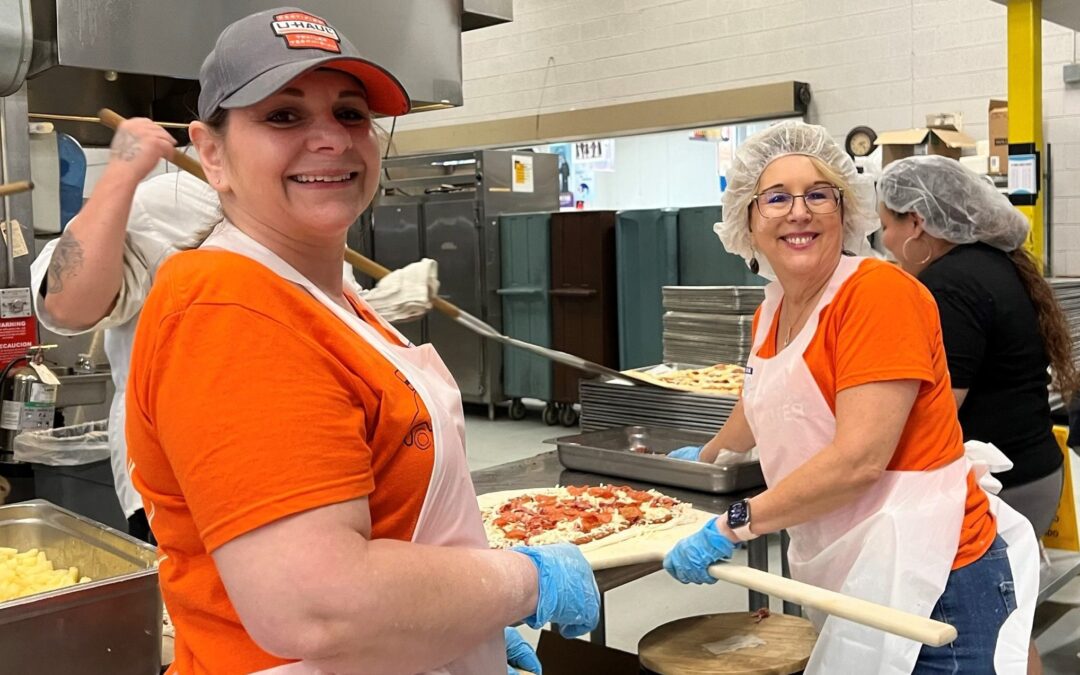 Pizza, Pizza: Volunteers Prepare Dinner at St. Vincent de Paul