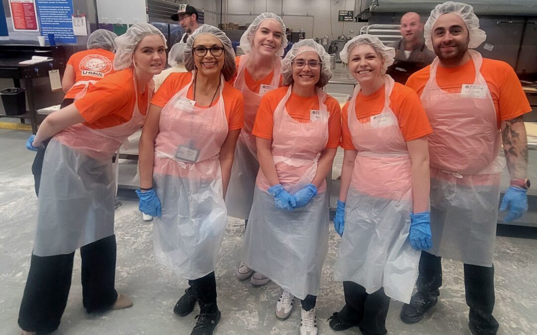 U-Haul® Volunteers Make More Than 100 Pizzas During St. Vincent de Paul Pizza Volunteer Day